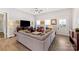 Inviting living room featuring a comfortable sofa, entertainment center, and modern decor at 1323 Stack Rd, Monroe, NC 28112