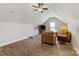 Spacious loft featuring seating area with comfortable couch, chair, and tv at 1323 Stack Rd, Monroe, NC 28112