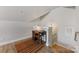 Office nook with a desk, rug, and stairs at 1323 Stack Rd, Monroe, NC 28112