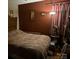 Modest bedroom with wooden headboard at 134 Weaver Hill Dr, Statesville, NC 28625
