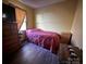 Bedroom with a single bed and vintage wooden chest at 134 Weaver Hill Dr, Statesville, NC 28625