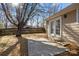Backyard featuring a concrete patio and wooden privacy fence at 13701 Dawlish Ln, Pineville, NC 28134