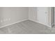 This bedroom offers neutral walls, carpet flooring, and outlets for convenience at 13701 Dawlish Ln, Pineville, NC 28134
