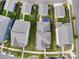Bird's eye view of a residential area, showcasing neat landscaping, backyard patios, and well-maintained properties at 13923 Jacks Ln, Pineville, NC 28134