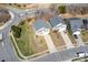 Aerial view of two homes with well manicured lawns at 203 Waterlemon Way, Monroe, NC 28110