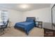 Bedroom featuring a queen bed, desk and nice closet at 203 Waterlemon Way, Monroe, NC 28110