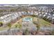 Aerial view of a neighborhood pool and playground area in a residential community at 203 Waterlemon Way, Monroe, NC 28110