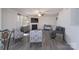 Comfortable living room with hardwood floors, fireplace, ceiling fan and sofa at 203 Waterlemon Way, Monroe, NC 28110