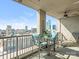 Comfortable balcony overlooking the city skyline with stylish seating, perfect for relaxing and entertaining at 222 S Caldwell St # 1803, Charlotte, NC 28202