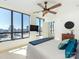 Bedroom featuring large windows with cityscape views, modern decor, and natural light at 222 S Caldwell St # 1803, Charlotte, NC 28202