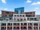 A modern condo building with a rooftop sign reading 'FAHRENHEIT,' highlighting city living at 222 S Caldwell St # 1803, Charlotte, NC 28202