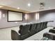 Home theater with comfortable seating and a large screen for an immersive entertainment experience at 222 S Caldwell St # 1803, Charlotte, NC 28202