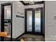A view of the foyer showcasing the doors, coat rack, overhead light, and seamless flow at 231 Sunny Path Ln, Statesville, NC 28677