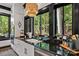 Close up of kitchen counter with beautiful view of the forest at 231 Sunny Path Ln, Statesville, NC 28677