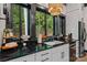 Kitchen sink with a beautiful view of the lush green forest at 231 Sunny Path Ln, Statesville, NC 28677
