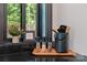 Countertop details, spices, framed art, and view of forest at 231 Sunny Path Ln, Statesville, NC 28677