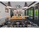 Bright open concept kitchen with stone fireplace and breakfast bar at 231 Sunny Path Ln, Statesville, NC 28677