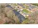 Aerial view highlighting a neighborhood of well-kept townhomes with mature landscaping and street parking at 234 Pointe Cir, Rock Hill, SC 29732