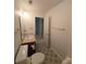 Standard bathroom with a single vanity, toilet, and patterned tile flooring at 234 Pointe Cir, Rock Hill, SC 29732