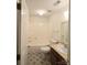 Bright bathroom featuring a tub/shower combo, single vanity, and tiled floors at 234 Pointe Cir, Rock Hill, SC 29732