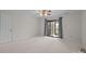 Large bedroom featuring a door to screened porch, neutral walls and carpet at 234 Pointe Cir, Rock Hill, SC 29732