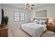 Serene bedroom featuring neutral tones, a comfortable bed, and ample natural light at 234 Pointe Cir, Rock Hill, SC 29732