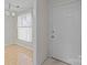 Inviting entryway with a door, a window and wallpapered accent wall at 234 Pointe Cir, Rock Hill, SC 29732