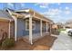 Charming townhome displaying a covered front porch and brick foundation with impeccable curb appeal at 234 Pointe Cir, Rock Hill, SC 29732