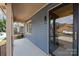 Charming covered front porch showcasing the home's blue siding and welcoming entrance at 234 Pointe Cir, Rock Hill, SC 29732