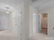 Hallway with multiple doorways leading to different rooms, including the bathroom at 234 Pointe Cir, Rock Hill, SC 29732