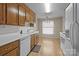 Well-equipped kitchen with white appliances, ample cabinets, and linoleum floors at 234 Pointe Cir, Rock Hill, SC 29732