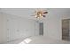 A spacious main bedroom featuring three closets and an open door to the en suite bathroom at 234 Pointe Cir, Rock Hill, SC 29732