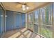 Cozy sunroom featuring wood floors and view of the backyard at 234 Pointe Cir, Rock Hill, SC 29732