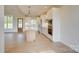 Spacious open floor plan showcases a modern kitchen with white cabinets, stainless steel appliances, and an island at 2355 Emanuel Church Rd, Rockwell, NC 28138