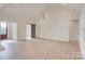 Bright living room with a vaulted ceiling and a sliding barn door at 2355 Emanuel Church Rd, Rockwell, NC 28138