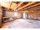 Unfinished basement with block walls, wood framing, and a concrete floor at 2375 E Nc 10 Hwy None, Conover, NC 28613