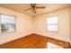 Sunny bedroom with hardwood floors, neutral walls and a ceiling fan at 2375 E Nc 10 Hwy None, Conover, NC 28613