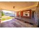 Covered carport area with concrete flooring and brick support columns at 2375 E Nc 10 Hwy None, Conover, NC 28613