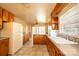 Spacious kitchen with wood cabinets, tile flooring, and a serving bar at 2375 E Nc 10 Hwy None, Conover, NC 28613