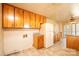 Functional kitchen with wood cabinets, tile flooring, and ample counter space at 2375 E Nc 10 Hwy None, Conover, NC 28613