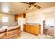 Cozy kitchen with wooden cabinets, laminate countertops, and an adjacent entryway at 2375 E Nc 10 Hwy None, Conover, NC 28613