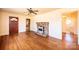 Inviting living room showcasing hardwood floors, a stone fireplace, and an entryway at 2375 E Nc 10 Hwy None, Conover, NC 28613