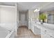 A spacious bathroom with a tub, shower, and vanity with great lighting at 252 Legend Dr, Rock Hill, SC 29732