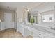 Bright bathroom with double sink vanity, large mirror, and tile flooring at 252 Legend Dr, Rock Hill, SC 29732