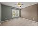 Comfortable bedroom with natural light, a ceiling fan, and neutral carpeting at 252 Legend Dr, Rock Hill, SC 29732