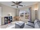 Inviting bedroom features a window view, foosball table, and comfy gray loveseat with a ceiling fan at 252 Legend Dr, Rock Hill, SC 29732