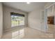 Cozy bedroom with tile flooring and large window overlooking landscaped backyard at 252 Legend Dr, Rock Hill, SC 29732