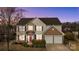 Charming two-story home with a well-manicured lawn, two-car garage, and inviting front entrance at 252 Legend Dr, Rock Hill, SC 29732