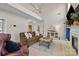 Bright and airy living room with soaring ceilings and a cozy fireplace feature at 252 Legend Dr, Rock Hill, SC 29732