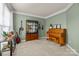 Elegant living room featuring a stylish cabinet, a piano, and a variety of decorative items at 252 Legend Dr, Rock Hill, SC 29732